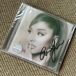 Autographed CD with Black Signature
